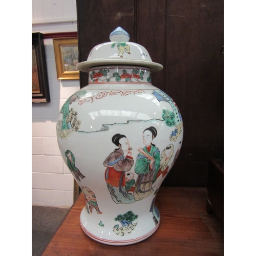 1105 - A Chinese porcelain famille verte temple jar with cover, decorated with figural scenes, mostly of ch... 