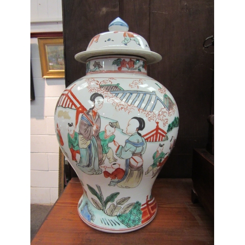 1105 - A Chinese porcelain famille verte temple jar with cover, decorated with figural scenes, mostly of ch... 