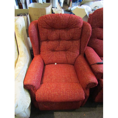 1136 - A Celebrity red upholstered armchair with button-back