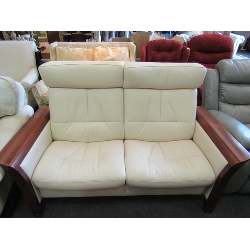 1141 - A Stressless cream leather two seater recliner sofa