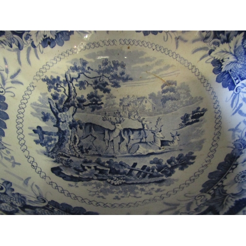 1269 - A blue and white bowl decorated with Stag scene, 30cm diameter