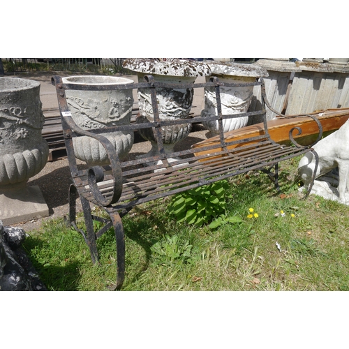 8057 - A scroll arm, strap metal three seater garden bench, 58.5