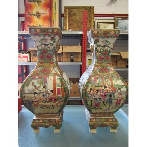 1172 - A pair of Chinese Canton porcelain Famille Rose vases on stands, floral and gilt decoration with pan... 