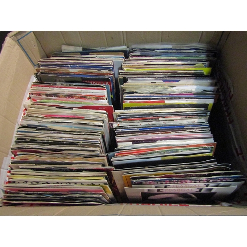 1218 - A box of 1980's vinyl singles