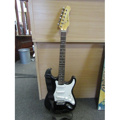 1232 - A Jay Turner Stratocaster style electric guitar and practice amp