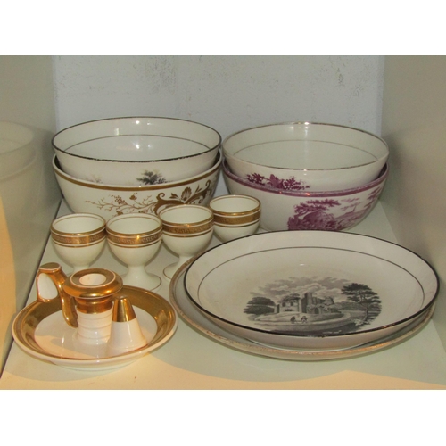 1383 - A collection of 19th Century bowls and dishes including Spode, four egg cups and a Spode candlestick... 