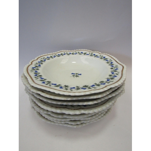 1387 - A set of early 19th Century Chamberlains plates and bowls decorated with blue flowers, four of each ... 