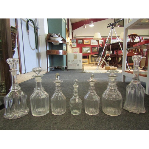 1454 - A collection of seven glass decanters including etched example, tallest 34cm (7)