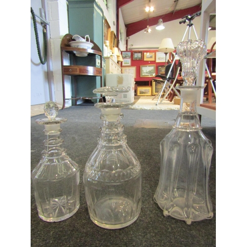 1454 - A collection of seven glass decanters including etched example, tallest 34cm (7)