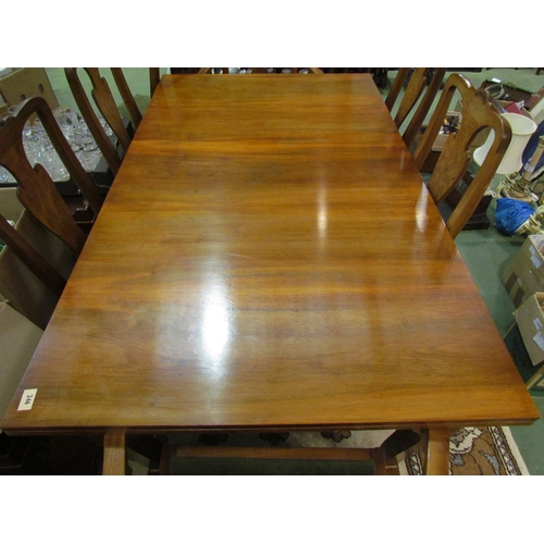 4104 - An Art Deco walnut extending draw-leaf dining table, 74cm tall x 153cm long x 92cm not extended, wit... 