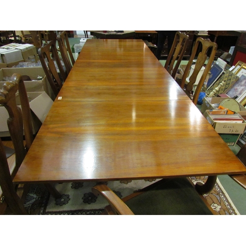 4104 - An Art Deco walnut extending draw-leaf dining table, 74cm tall x 153cm long x 92cm not extended, wit... 