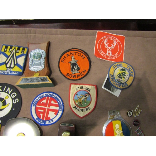 4432 - A box of archery medals, trophies and patches etc.