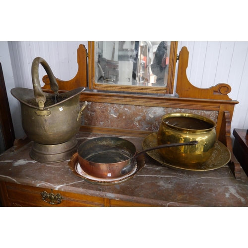 2129 - Five pieces of antique copper and brass including a large oriental brass charger and brass coal scut... 