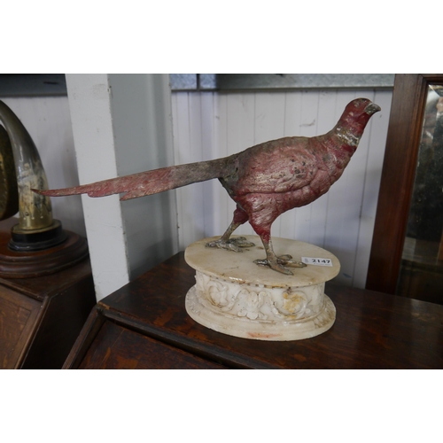 2241 - A 1920's painted brass or bronze pheasant, mounted on associated marble base, used as a Teachers whi... 