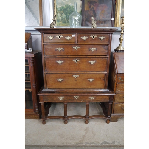 2137 - A William and Mary oak chest on later stand