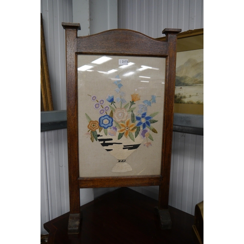 2161 - An Arts and Crafts oak framed fire screen with needle point decoration and a Victorian mahogany dres... 