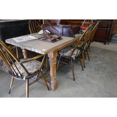 2200 - A pine refectory table on H stretcher base