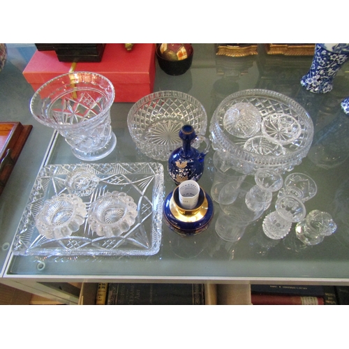 1143 - A selection of cut glass including Waterford. Also a Ferro & Lazzarini Murano gilt and blue glass va... 