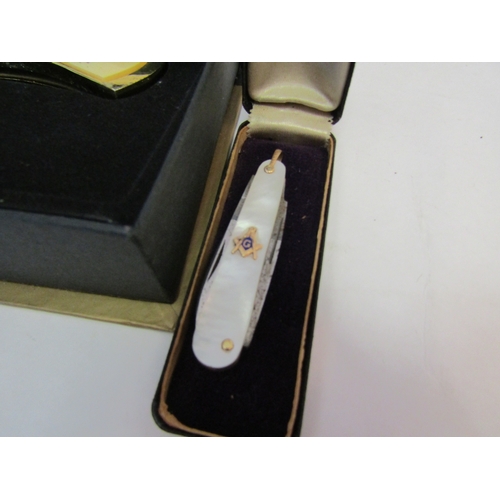 1299 - A cased Masonic penknife with mother-of-pearl handle together with a George Washington Commemorative... 