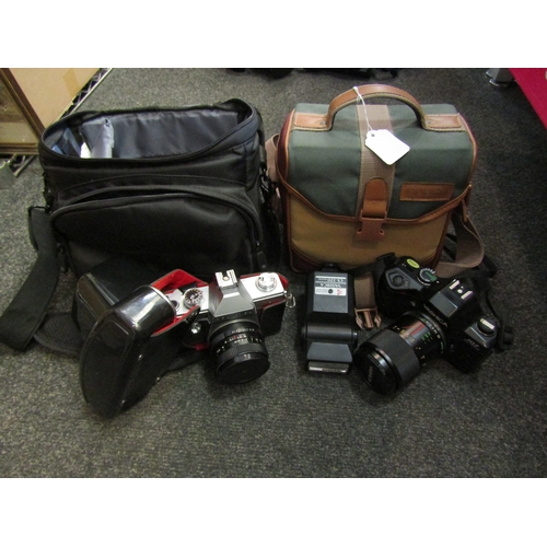 1420 - Four 35mm cameras including a Minolta 7000AF