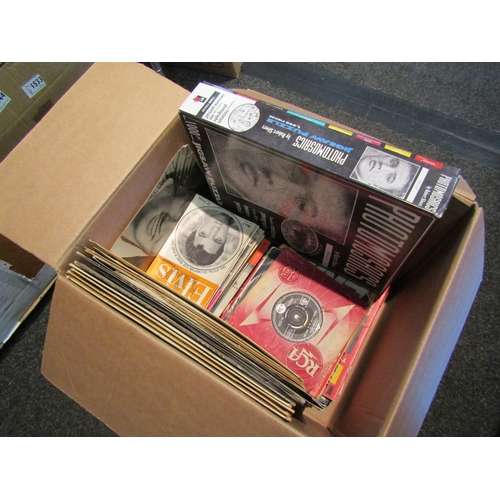 1437 - A box of Elvis Presley memorabilia including vinyls, singles, Elvis Monthly magazines, books, Elvis ... 