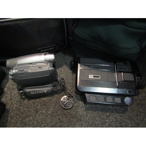 1442 - A Hanimex Compact CPM 31, Sony Handycam DCR-HC44 and a bag of cameras and accessories