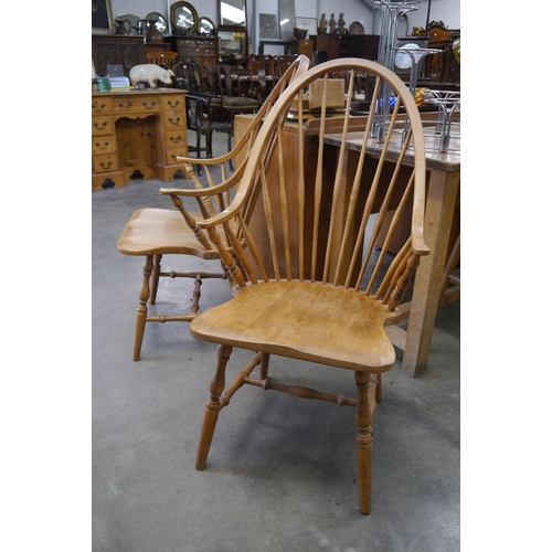 2005 - Two beech stick back chairs