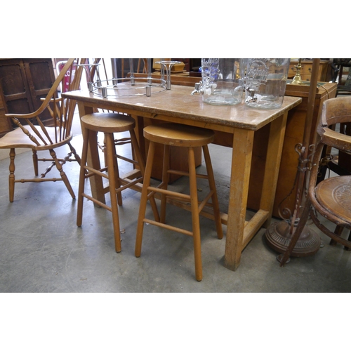 2007 - A teak top school desk on beech legs and two stools