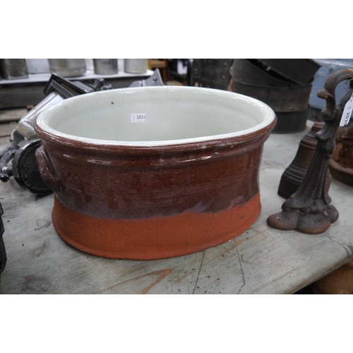 2031 - A Victorian glazed terracotta dairy bowl