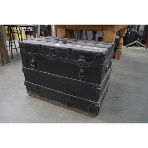 2036 - A black stained Pirates trunk