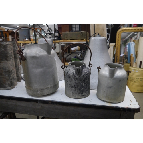 2040 - Three metal milk churns