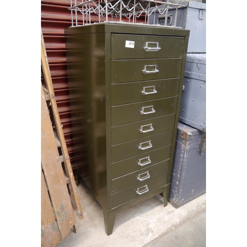 2079 - A nine drawer green filing cabinet