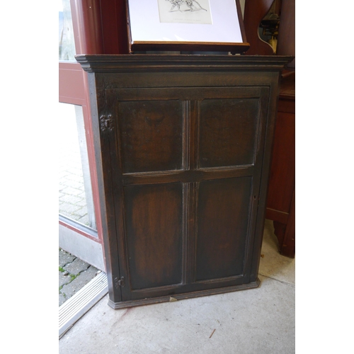 2105 - A 1950's mahogany corner cabinet