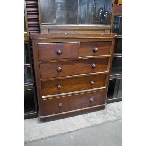 2112 - A Victorian mahogany two over three chest of drawers