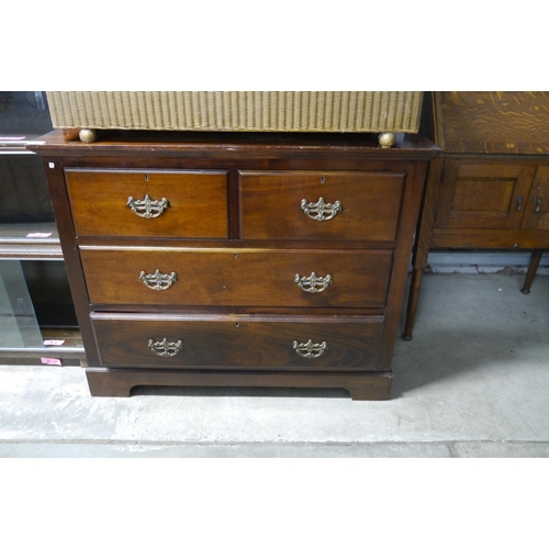 2116 - A Edwardian mahogany two over two chest of drawers