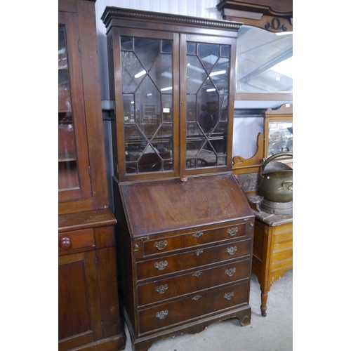 2125 - A flame mahogany astragal glazed bureau bookcase