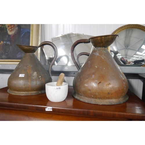 2134 - Two copper measuring jugs, four gallon and three gallon