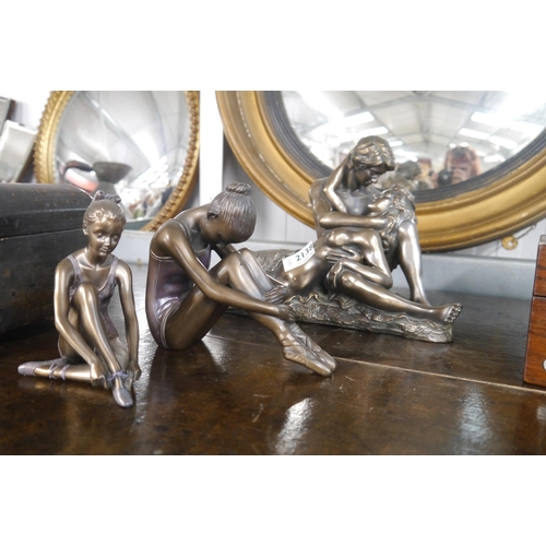 2138 - A resin bronze figure of a longing couple and two ballerina's