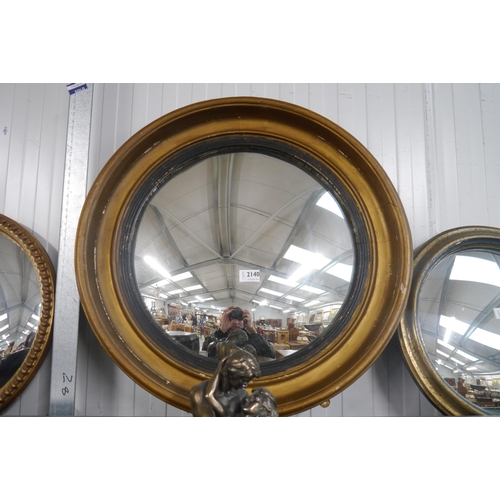 2140 - A 19th Century  circular wall mirror (frame loose)