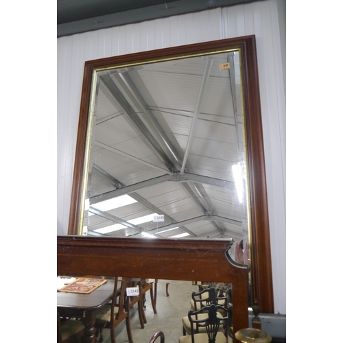 2142 - A mahogany framed bevelled edge mirror