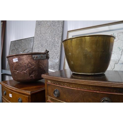 2151 - An 18th Century battered copper and iron pot and brass jardiniere