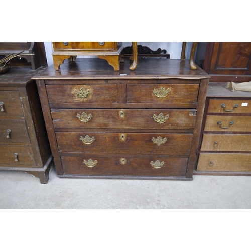 2153 - A Jacobean oak two over three chest of drawers, bottom drawer fixed shut