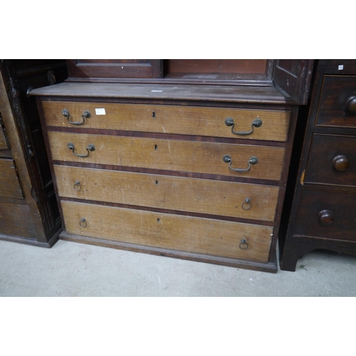 2154 - A George III mahogany straight front chest of four long graduated drawers, a/f and feet missing