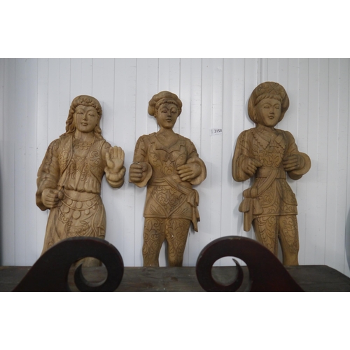 2158 - Three carved wooden figures