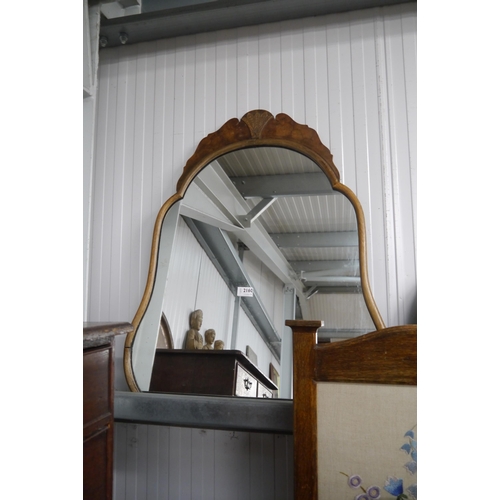 2160 - A pear shaped, walnut framed mirror