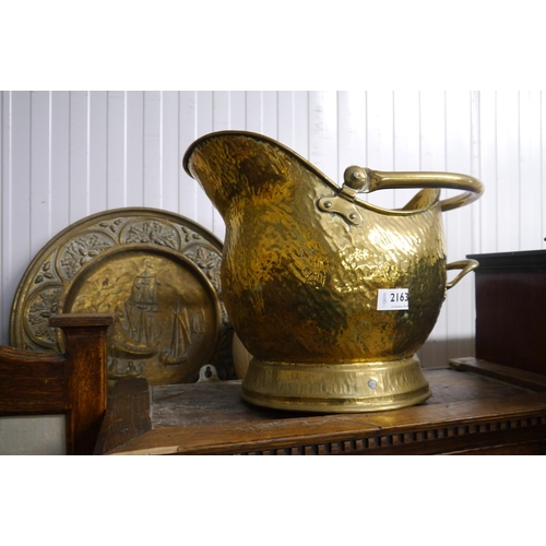 2163 - A brass coal helmet and two chargers