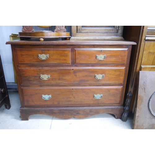 2164 - An Edwardian mahogany two over two chest of drawers