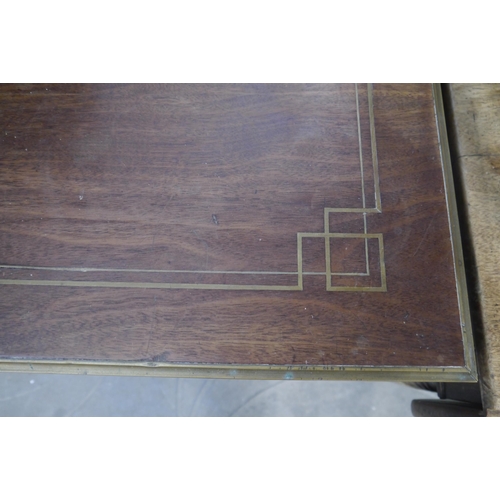 2177 - A continental brass inlay walnut games table on fluted legs, folding top