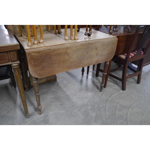 2178 - A Victorian drop-flap table with single drawer