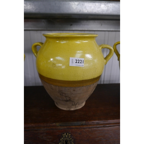 2221 - A yellow glazed twin handled pot